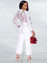 Einteiliger Jumpsuit mit langen Ärmeln und Spitze